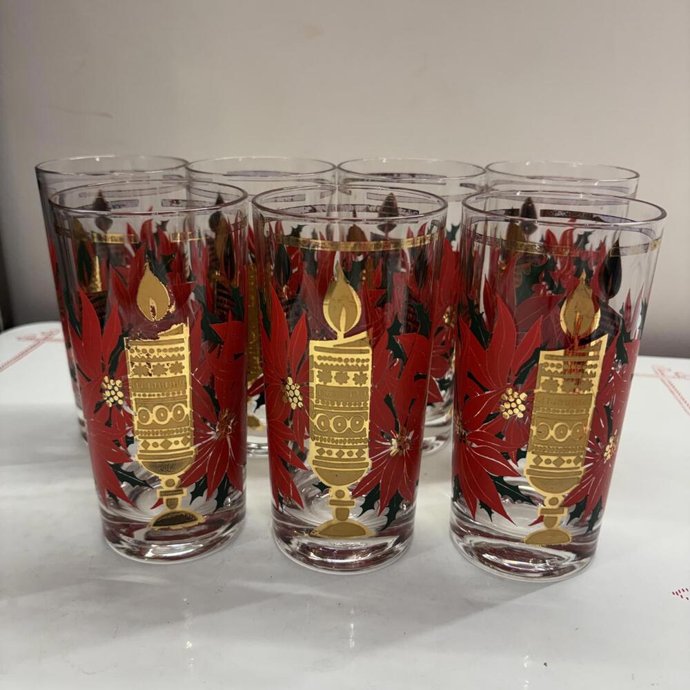 Set of 7 mid century gold candles with red poinsettia glass set